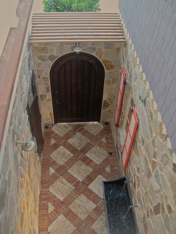 main entrance, as seen from above, on the 2nd story lanai.