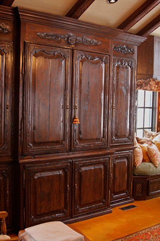 family room
- custom designed walnut entertainment armoire