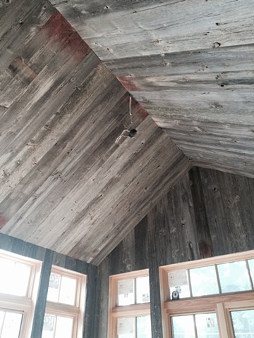 detail of the barn wood on the ceiling of the breakfast room.