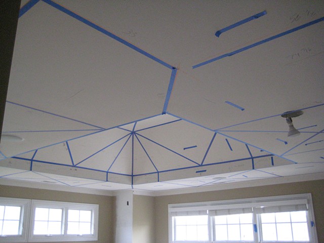 laying out the pattern for the master bedroom ceiling