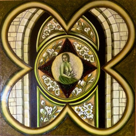 Woman sitting enclosed by mosaic star and flowers. 