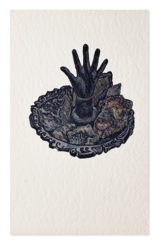 Hand Dish holding Rocks