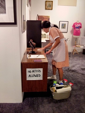 Rosa cleaning San Diego Museum of Art booth