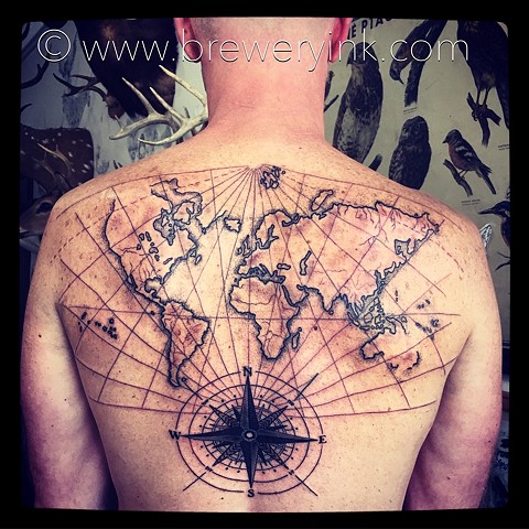 world map traveller tattoo