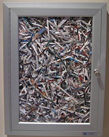 Nest (Faded Memories), 2012, 23.5 x 17.5 x 2 in., found metal cabinet and shredded personal photos (selected for Assistance League Celebrates Texas Art 2013, Irene Hofmann, juror)