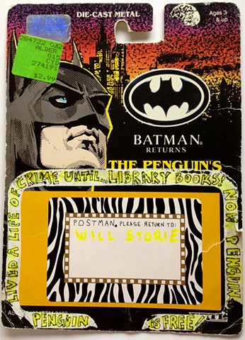 An Artmail postcard made of recycled Batman Returns toy packaging with stickers 