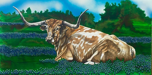 Texas longhorn in bluebonnets