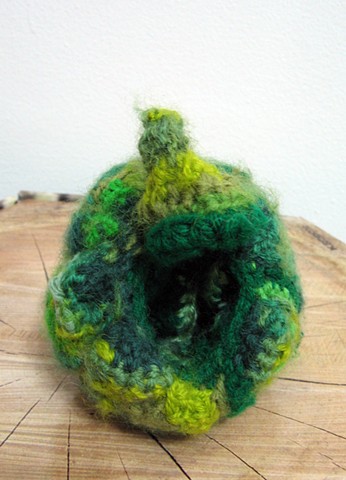 Crochet bell pepper green pepper toy yarn fiber art by Pat Ahern. 