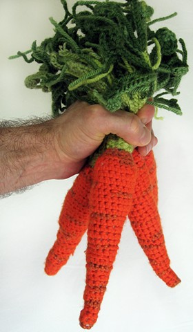 Crochet carrot vegetable yarn fiber art by Pat Ahern..