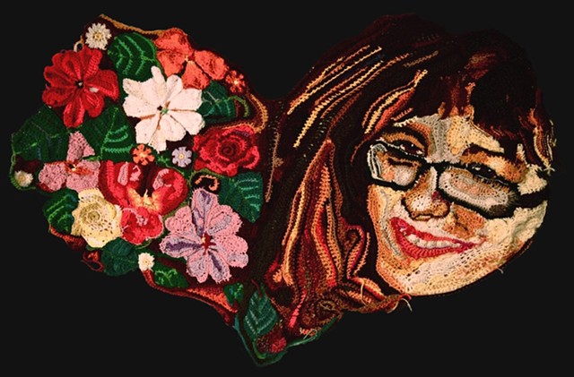 Crochet art portrait of a woman crochet flowers heart crochet fiber art by Pat Ahern.