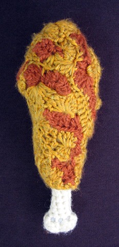 Crochet chicken drumstick yarn fiber art by Pat Ahern.