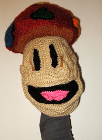 Crochet mushroom puppet yarn fiber art by Pat Ahern.