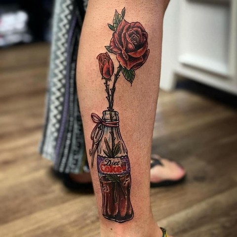Rose in a Coke bottle