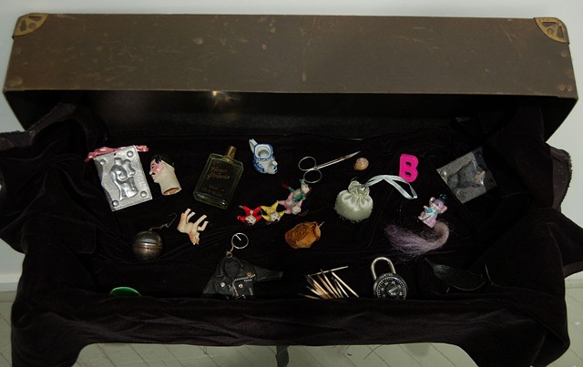small objects; suitcase