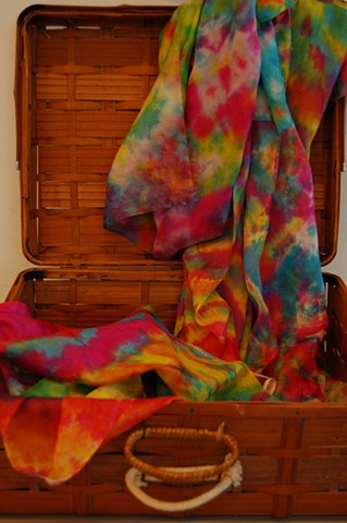Technicolor Tents; close-up of basket with scarves for visitors to play and experiment with