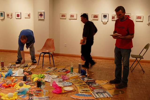Mandala of Impermanence; opening, students perusing and choosing items from the installation