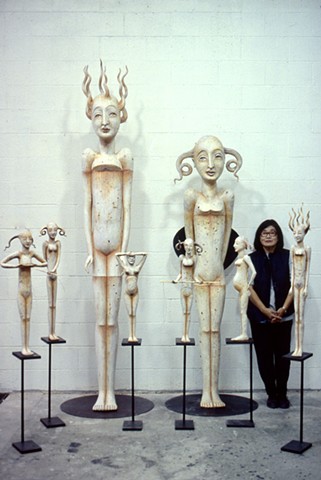 Patti Standing with Milepost Queens, ca 2003