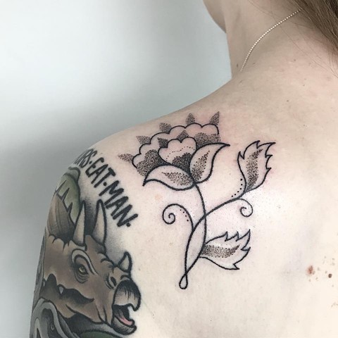 Ornamental flower by Melbourne tattoo artist Amy Jones. Resident artist located in Coburg at La Flor Sagrada Tattoo and art studio. Female tattooer, female tattoo artist. Coburg, Victoria