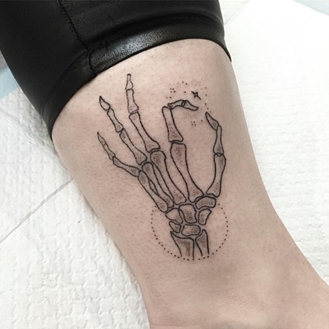Skeleton hand tattoo. Hand poke tattooing by female tattooer Amy Jones. Located in Coburg, Victoria. Melbourne art studio. Stick and poke tattooer. Professional tattooing in Melbourne