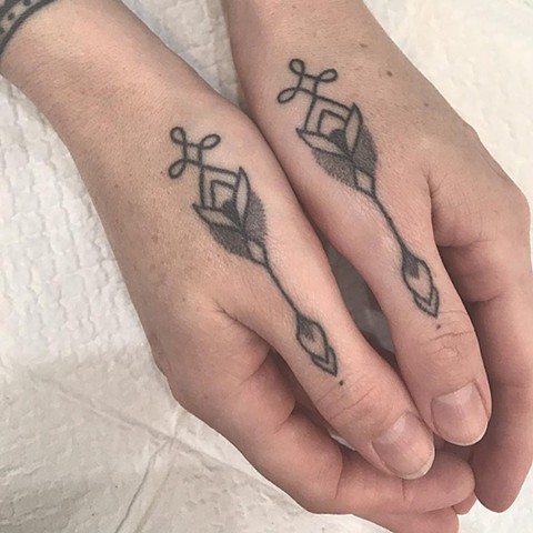 Healed Thumb adornments using black ink. Tattooed by Amy Jones at La Flor Sagrada Tattoo, Melbourne. Tattooed on fellow tattooer Eddy Lou from Newcastle. 