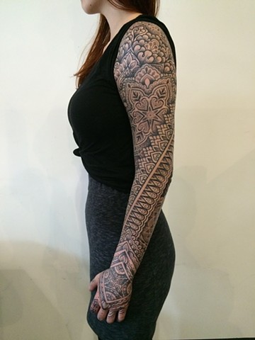 Ornamental floral geometric blackwork sleeve tattoo by Alvaro Flores Melbourne tattoo studio La Flor Sagrada Tattoo Coburg