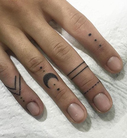 Perfect finger tattoos in black ink by Amy Jones tattoo artist. Located in Melbourne. Black ink tattooing. Art studio in Coburg