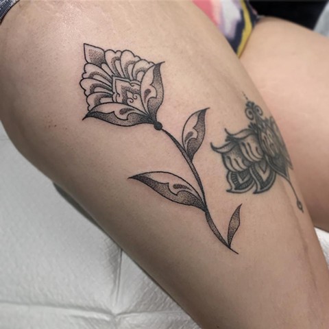 Amy Jones aka. Amy Unalome. La Flor Sagrada Tattoo, Melbourne. Ornamental flower tattoo on thigh.