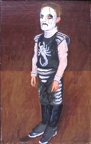 a child wearing a black and white scorpion costume with a full mask.
