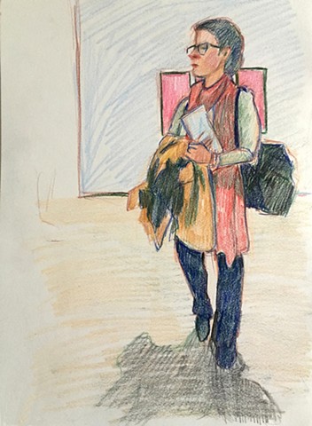 A woman walks through a gallery wearing a pinks scarf, with a coat draped over her arm.