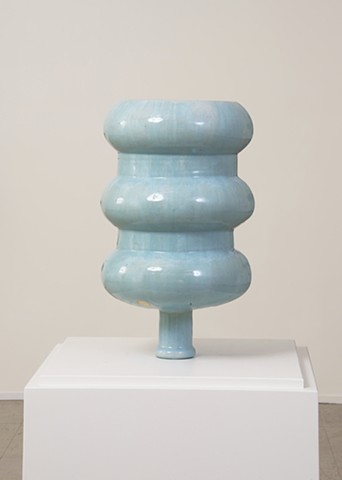 blue water bottle ceramic conceptual sculpture by artist Jeff Krueger