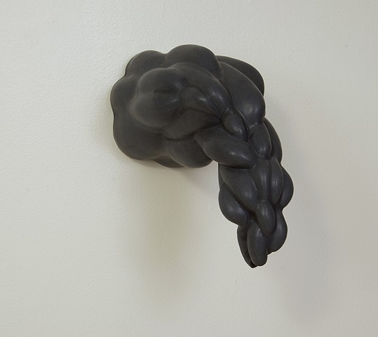 biomorphic ceramic sculpture in black by artist Jeff Krueger