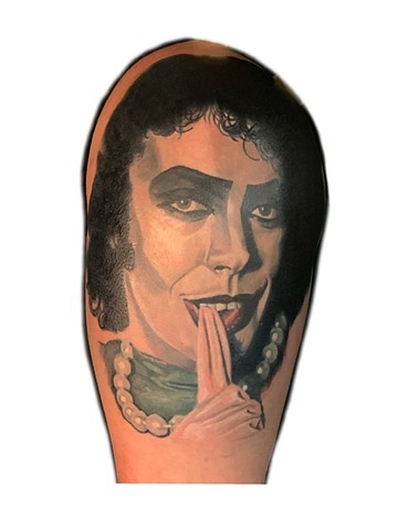 A portrait of Dr. Frankenfurter from the rocky horror picture show.