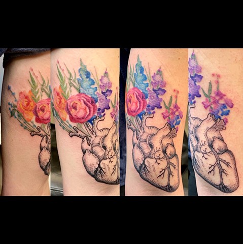 An anatomical illustration of a printed heart with watercolor flowers in the veins.