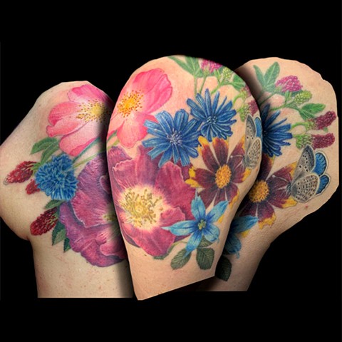 Floral Bouquet tattoo on a shoulder with wildflowers and roses