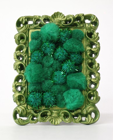 found picture frame sculpture painted filled bright green pom poms by Holly Campbell