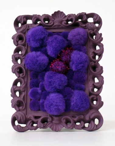 sculpture found picture frames painted purple with shiny purple pom poms by Holly Campbell