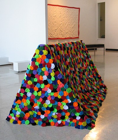 tent sculpture with rainbow pipe cleaners, felt and blue strung beads by Holly Campbell