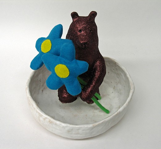 ceramic bear sculpture with felt mixed media flowers glittered in ceramic bowl collaborative piece between Holly Campbell and Brad Dinsmore visual artists