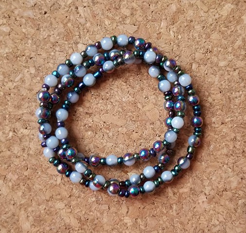 bracelets cosmic blue irridescent seed beaded multi-strand bracelets with stretch cord by Holly Campbell