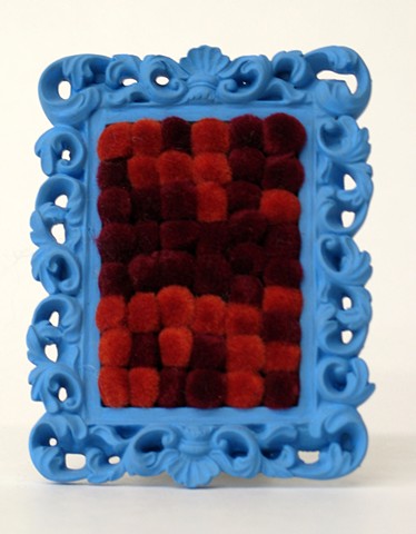 sculpture found picture frames painted sky blue with rust maroon pom poms by Holly Campbell