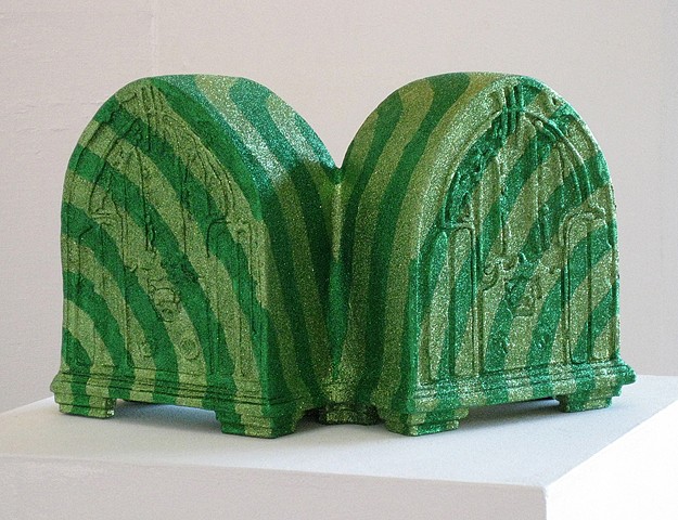 terra cotta low fire ceramic sculpture of conjoined early twentieth century radios covered in green glitter stripes by holly Campbell