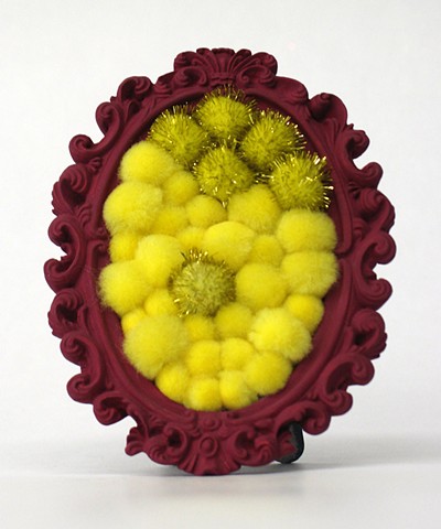 sculpture found oval picture frames painted red violet with shiny yellow pom poms by Holly Campbell