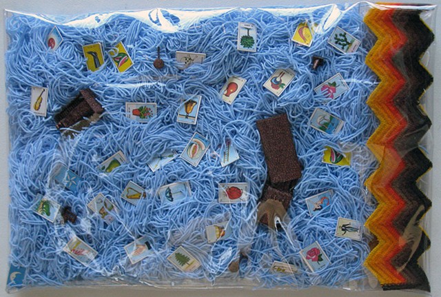 sculpture pillow clear plastic Loteria cards and glittered toy trucks yarn by Holly Campbell