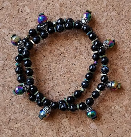 bracelets black licorice beads fire polished beads stretch cord by Holly Campbell