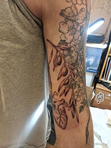 Flowers and olives tattoo