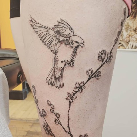 Bird and flower sketch tattoo