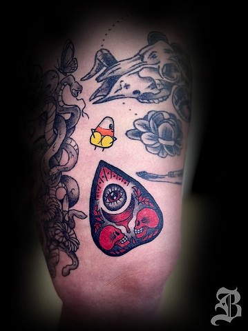 Planchette and candy corn tattoos