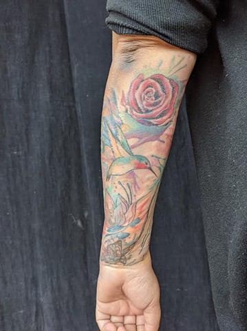 Floral watercolor tattoo