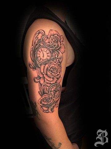 Pocket watch and roses tattoo
