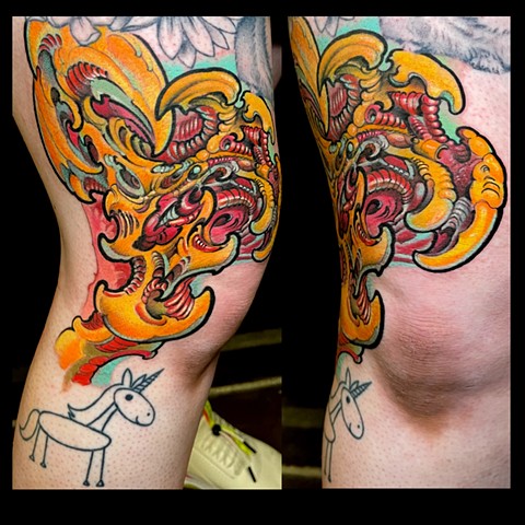 Colorful biomech tattoo 